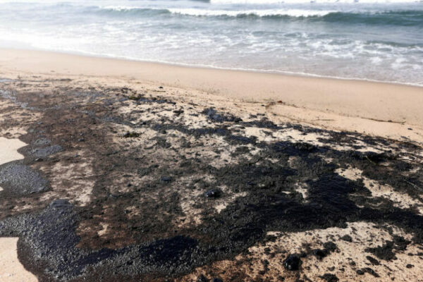 HUNTINGTON BEACH, CALIFORNIA - OCTOBER 03: Oil is washed up on Huntington State Beach after a 126,000-gallon oil spill from an offshore oil platform on October 3, 2021 in Huntington Beach, California. The spill forced the closure of the popular Great Pacific Airshow with authorities urging people to avoid beaches in the vicinity.  (Photo by Mario Tama/Getty Images)